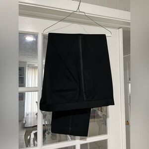 Men’s black tux pants.